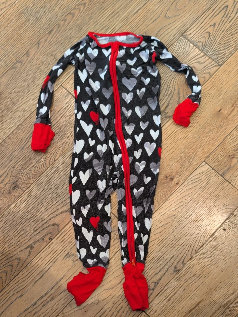 Little Sleepies Black Heart-Print Footed Pajamas with Red Trim